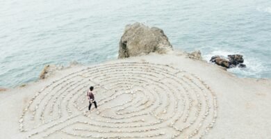 person walking on beach during daytime